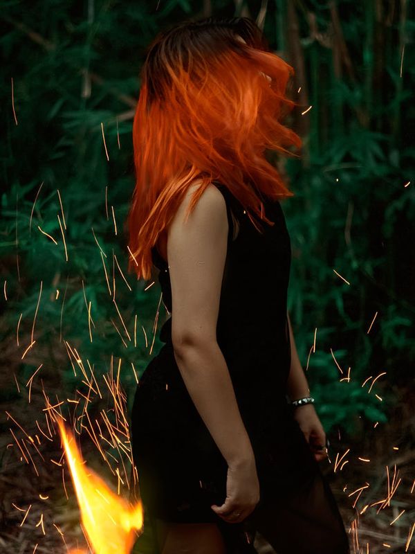 Silhouette of a person standing tall and balanced, glowing with inner energy.